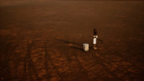 old rusted metal well in desert