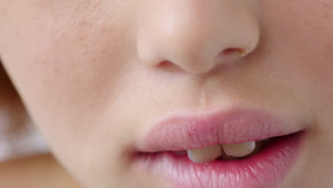 close-up of a woman's smiling mouth and lips