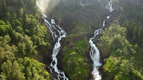 latefossen is one of the most visited waterfalls in norway and is located near skare and odda in the region hordaland, norway. consists of two separate streams flowing down from the lake lotevatnet.