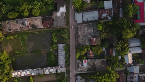 road goes through suburban slum town