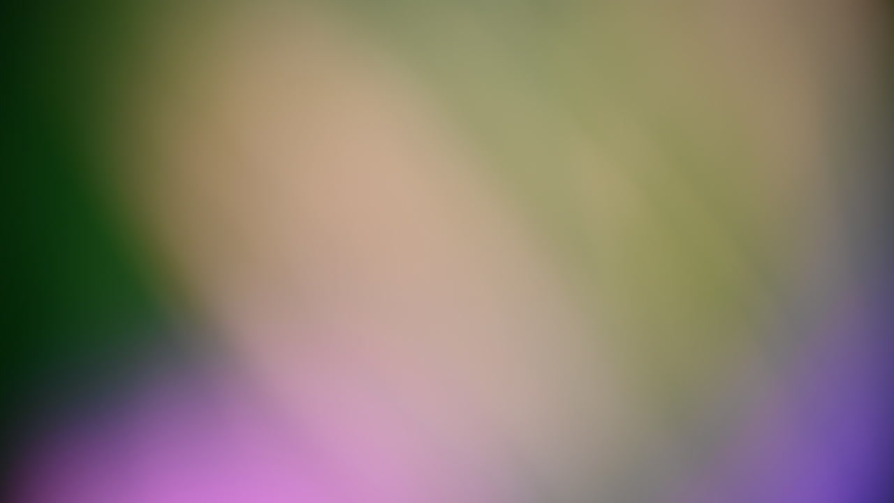 Blurred green and beige abstract background with soft gradients