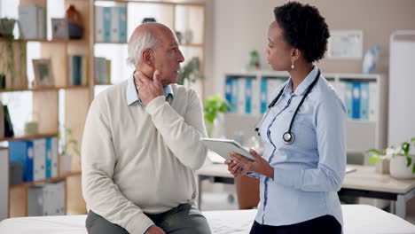 doctor consulting with senior patient
