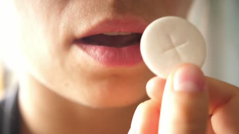 faithful receiving holy communion on the tongue