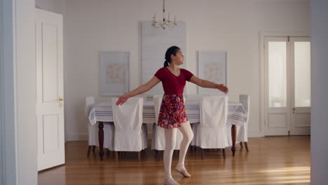 beautiful teenage ballerina girl dancing practicing ballet dance moves playfully rehearsing at home 4k