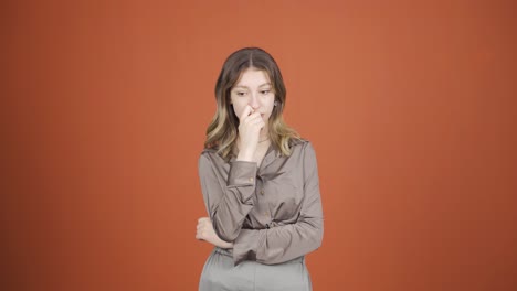 Young-woman-looking-depressed-at-camera.