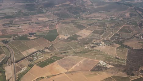 aerial shot of some beautiful farmland and agriculture zones