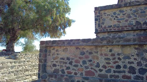 In-detail-a-small-pyramid-from-the-ancient-city-of-Teotihuacan,-admiring-its-impressive-architecture-and-unique-details