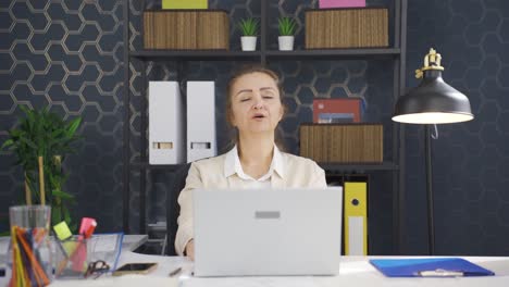 Business-woman-finishing-her-work-and-relaxing.