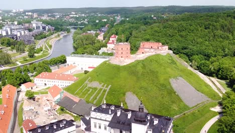 vilnius cityscape surrounding iconic gediminas castle, aerial orbit view