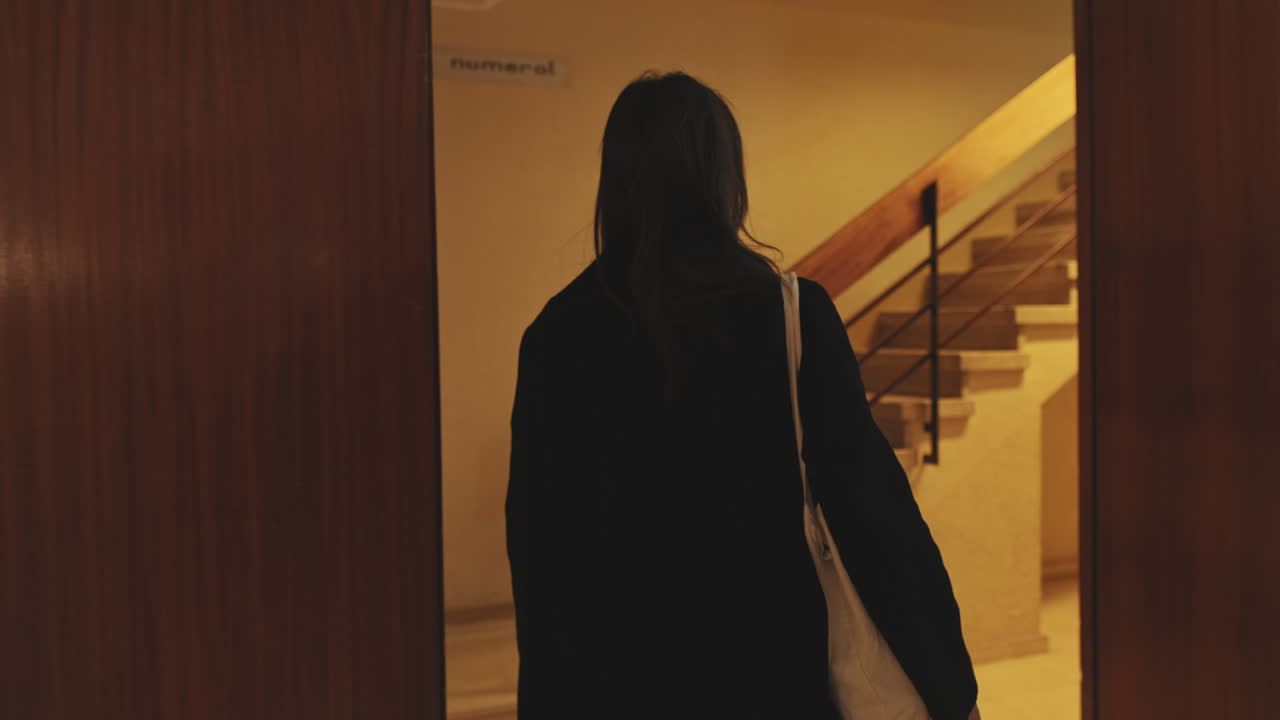 Woman walking indoors