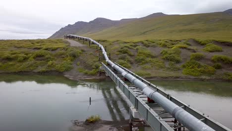 environmentally controversial crude oil pipeline in alaska - aerial drone