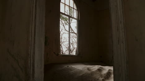 abandoned room filled with sand