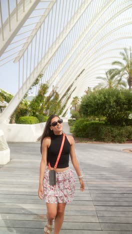 woman walking in a modern park