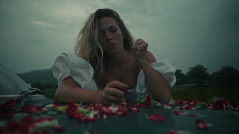 woman with flowers on car