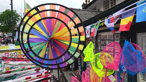 vibrant wind wheel spinning at a market