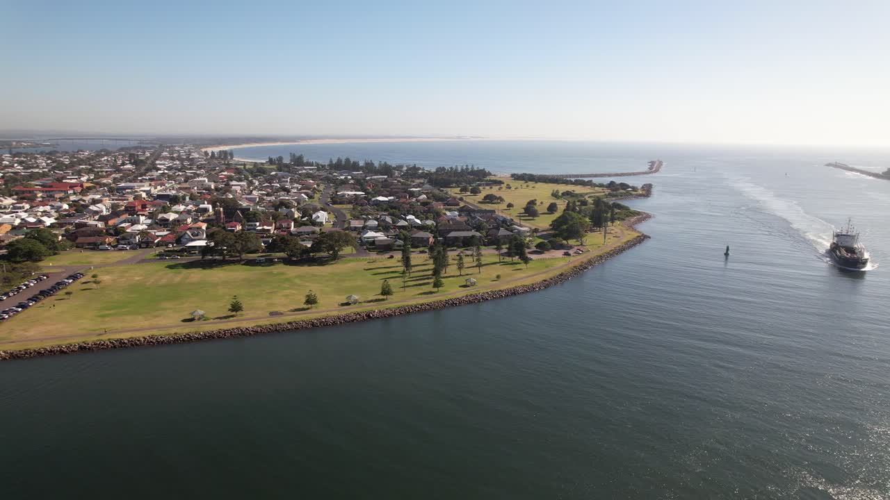Pitt Street Reserve And Griffith Park On Hunter River In Stockton, NSW, Australia. aerial sideways shot