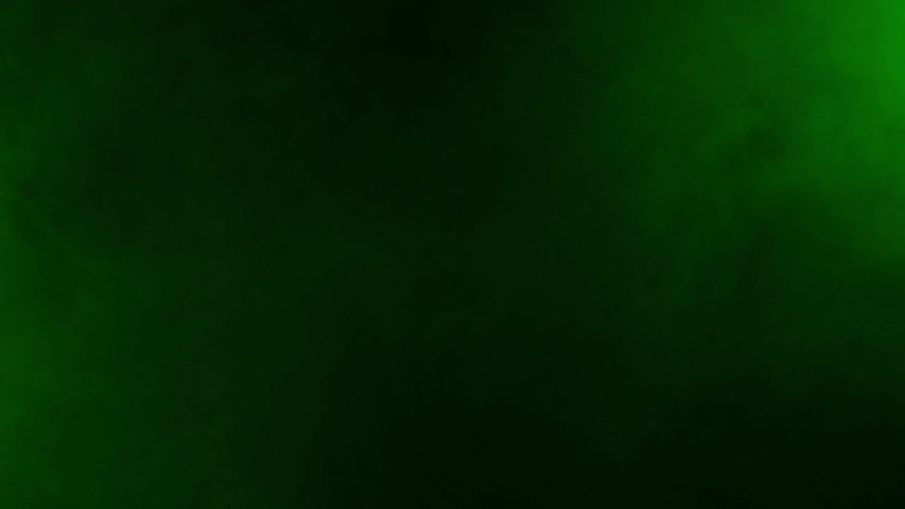 Realistic green smoke mist or fog drifts and swirls on black background. Ideal for overlays, special effects, and creating a mysterious, toxic, poison, radioactive or magical atmosphere