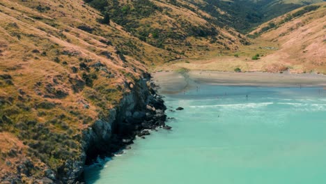 drone shot of cliffs and beach in summer