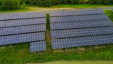 Captivating-aerial-4K-drone-footage-of-a-solar-panel-plant-nestled-alongside-the-Drava-river-in-Slovenia