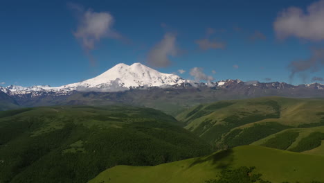 Elbrus-Region.-Flying-over-a-highland-plateau.-Beautiful-landscape-of-nature.-Mount-Elbrus-is-visible-in-the-background.