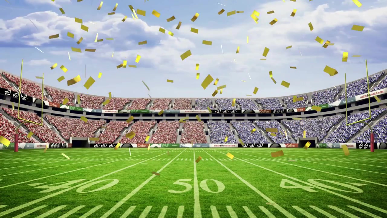 Gold confetti drifting from top swirling across field marking postgame celebration moment