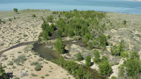 Aerial-view-Mono-Lake,-tufa-rock-formations-during-summer-season,-Mono-County,-California,-USA