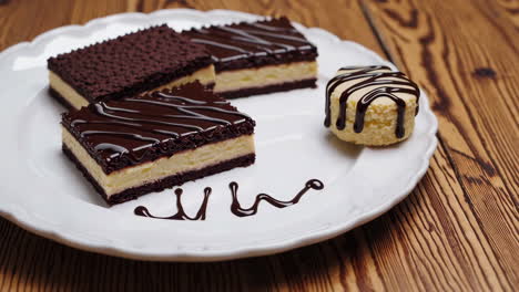 chocolate and cheesecake squares with drizzled chocolate