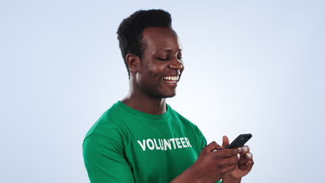 Volunteer,-phone-and-happy-black-man-reading