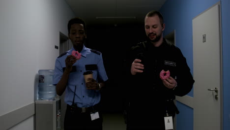 Team-in-uniform-relaxing-on-the-corridor