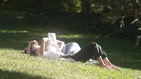 couple reading in a park