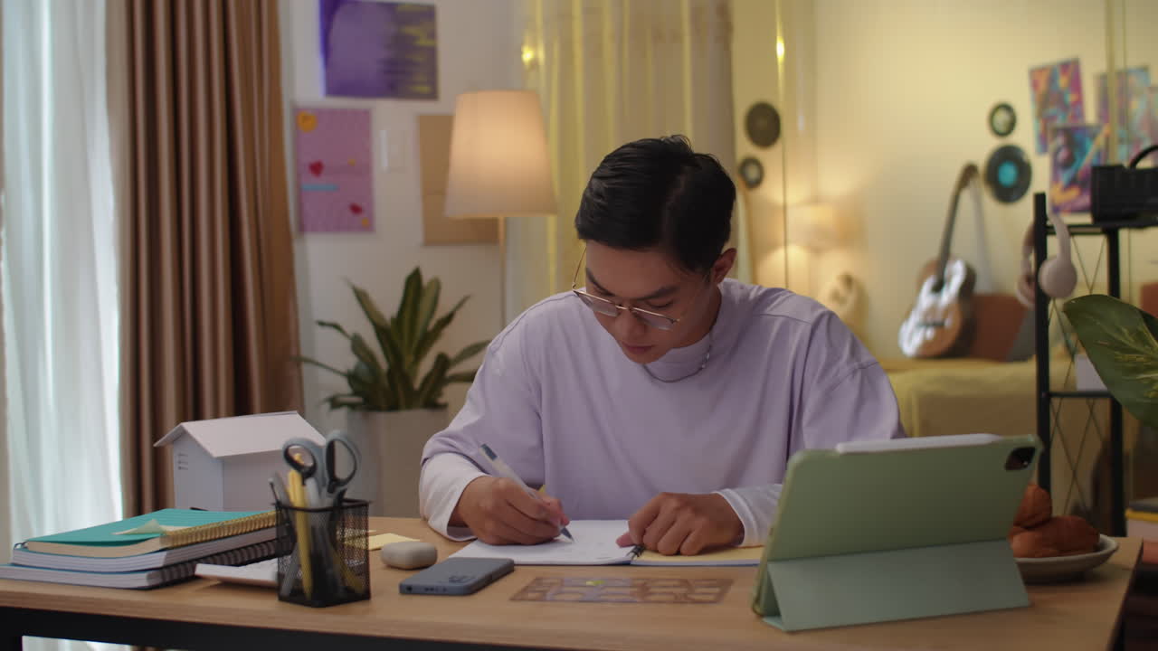 College Student Preparing for Project Presentation at Home