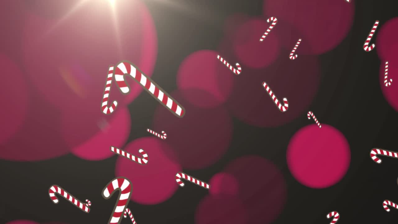 animación de cañas de caramelo de navidad cayendo y focos rosados sobre fondo negro.