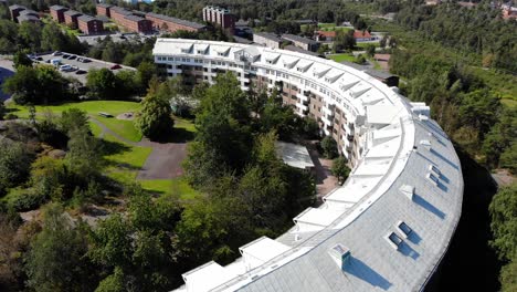 drone aerial view of tycho brahes gata, bergsjon, gothenburg, modern residential neighborhood on sunny summer day