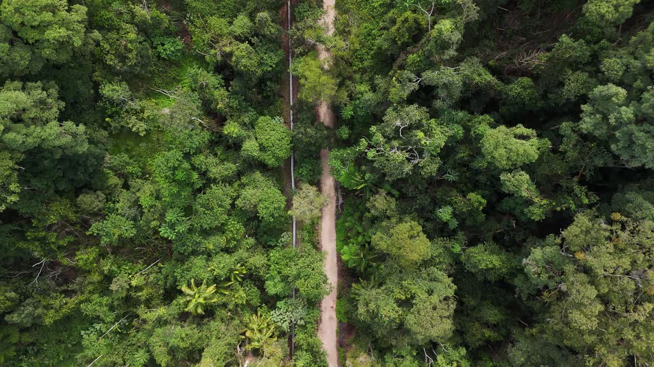 Aerial view of the Northern Rivers Rail Trail leading to the old Burringbar Range train tunnel. Tweed Heads Australia.