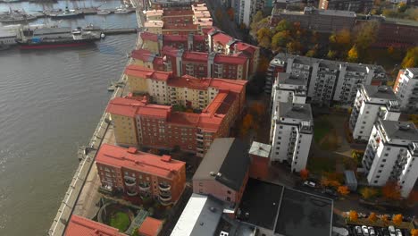 aerial view of tall apartment buildings rooftops near the sea port in eriksberg, gothenburg