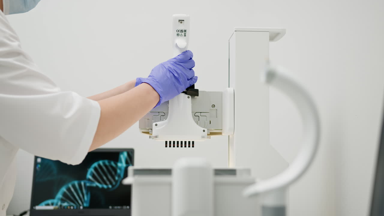 Scientist using a micropipette in a laboratory