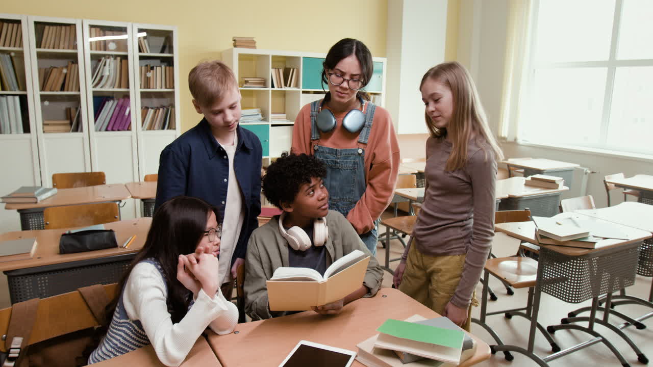 Diverse Group of Students Reading and Collaborating in a Classroom
