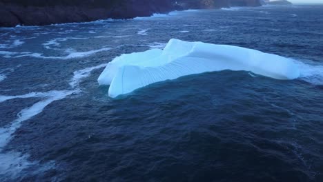 iceberg floating near the coast