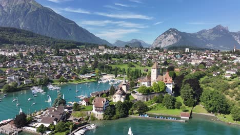 aerial - spiez marina by lake thun with mountains in kanton bern, switzerland