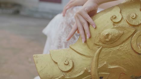 hand touch head dragon or naga statue, slow motion