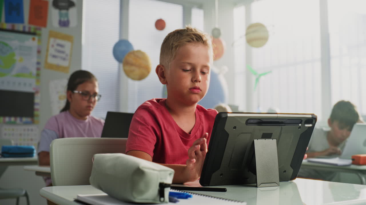 Students using tablets in a classroom