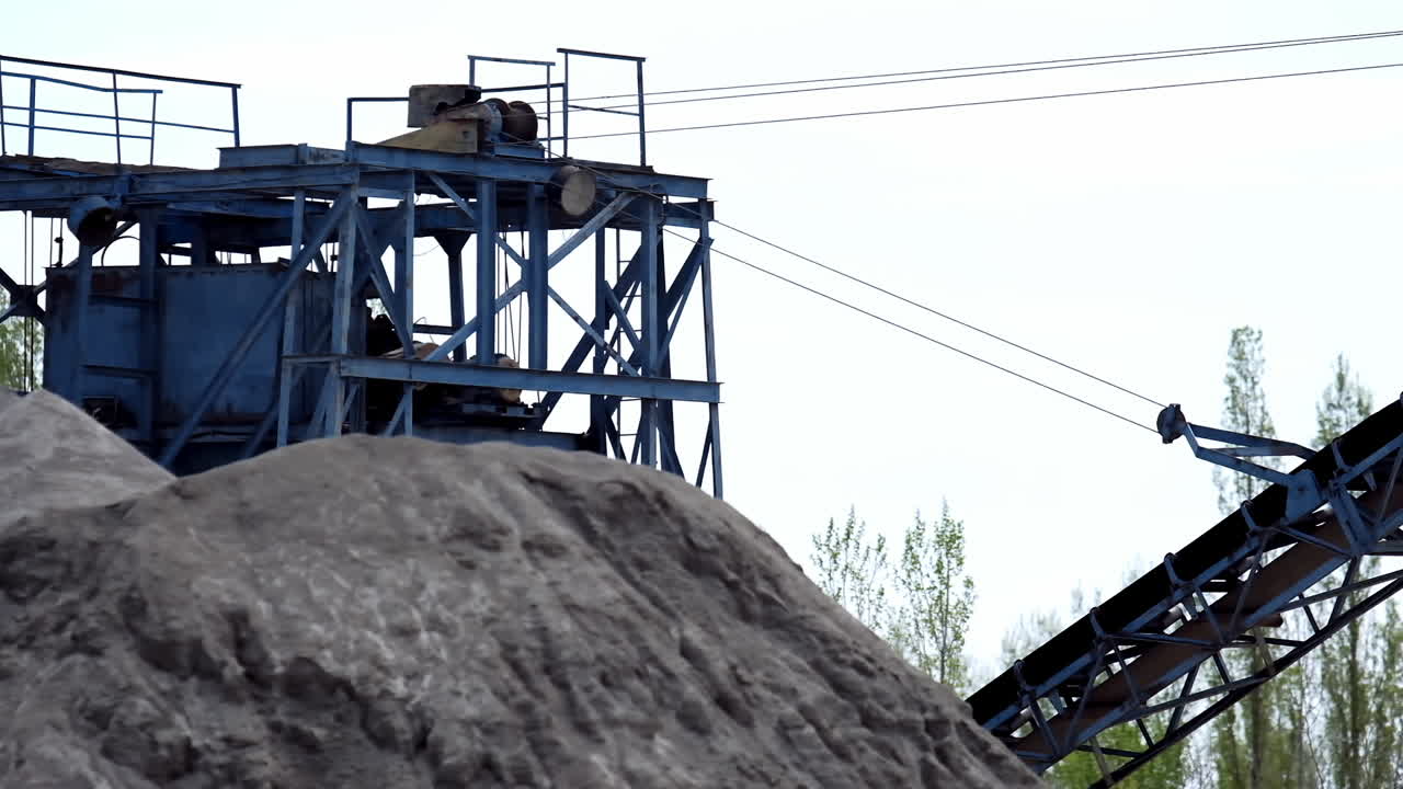 Industrial stone production. Industrial background with working gravel crusher