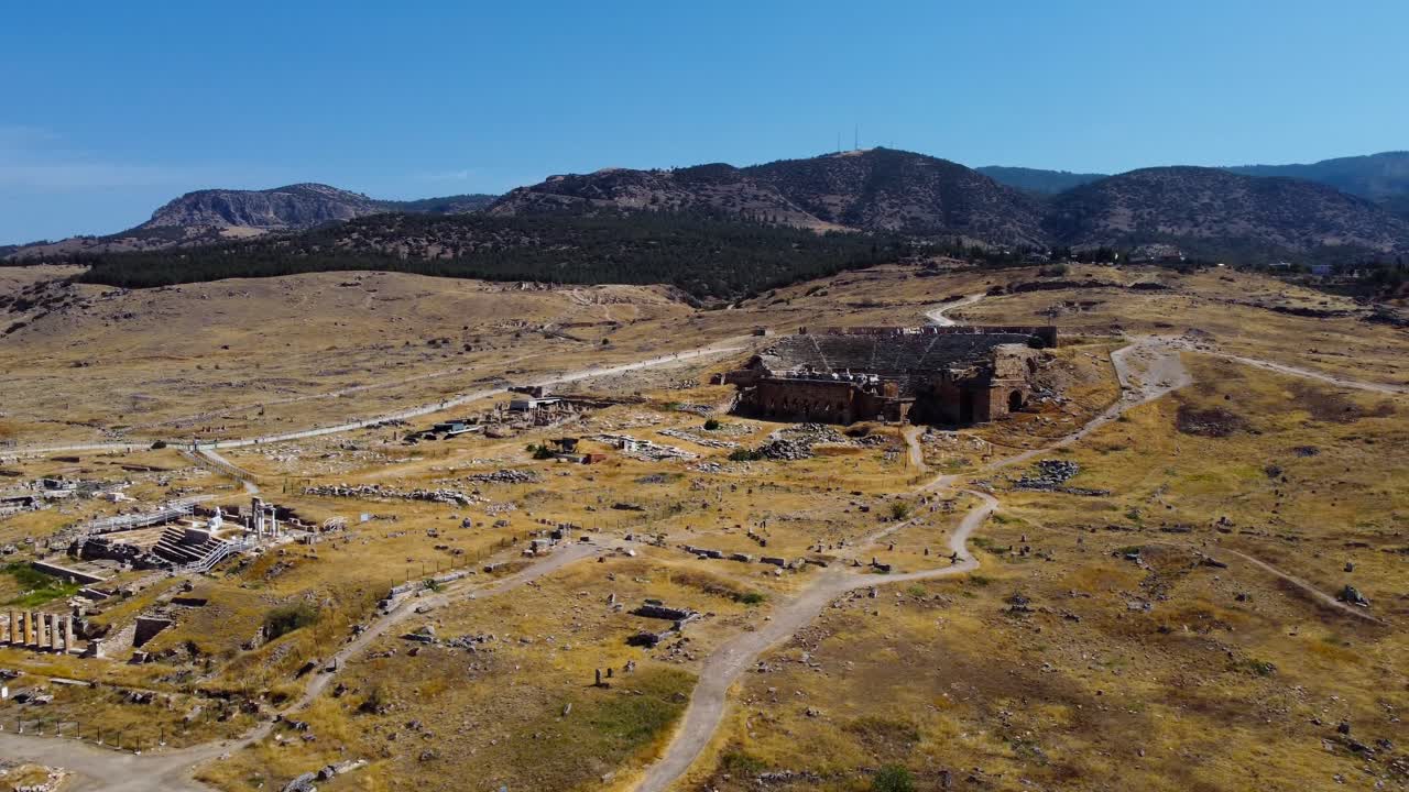 Ancient ruins and the impressive amphitheater of Hierapolis in Pamukkale, Turkey