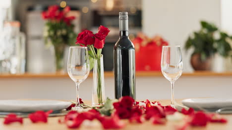 romantic dinner setting with red roses and wine