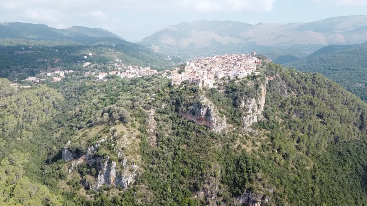 Aerial landscape view of Camerota village on top of a hill on the Apennine mountains, Italy