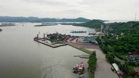 aerial footage of public passenger ferries parked at the port of dermaga ferry lembar lombok indonesia