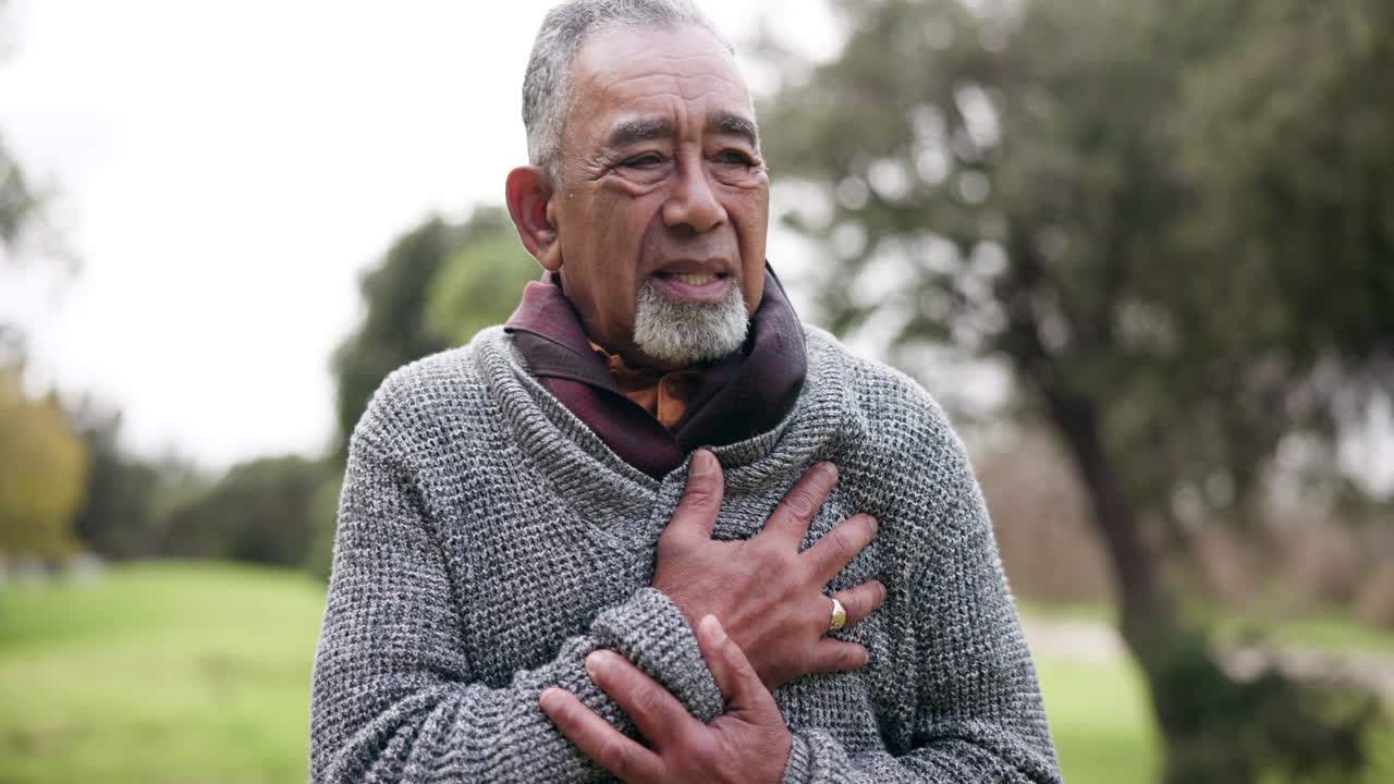 Nature, medical and senior man with a heart attack