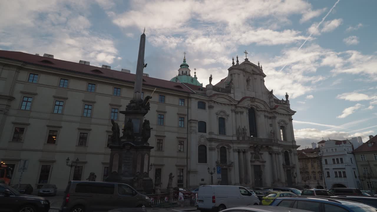 Architectural view of a church and monument in a European city