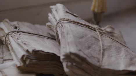 faith and ancient scholars study religious texts on weathered scrolls and documents - history and faith