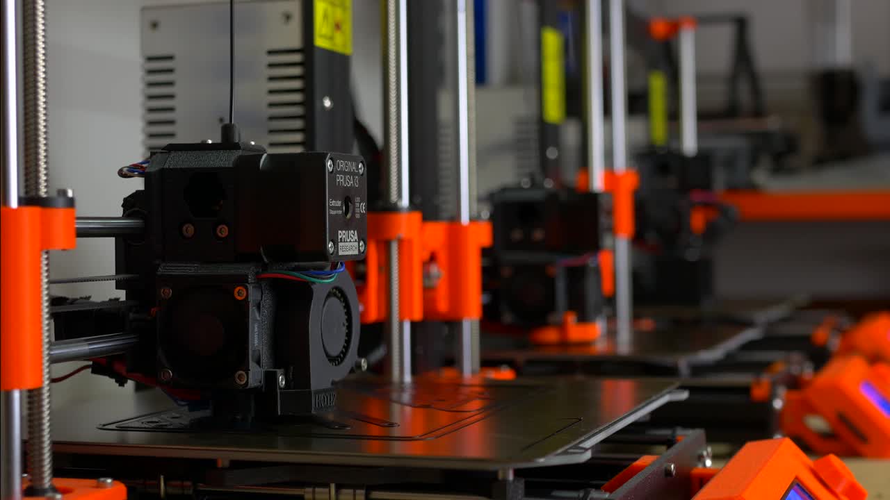Row of 3D Printers Moving and Working in a Futuristic Workshop.